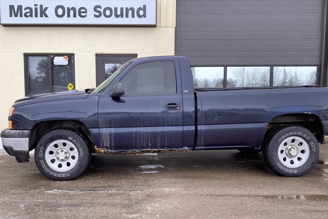 GMC 2006 Sierra with professional window tint in North Bay